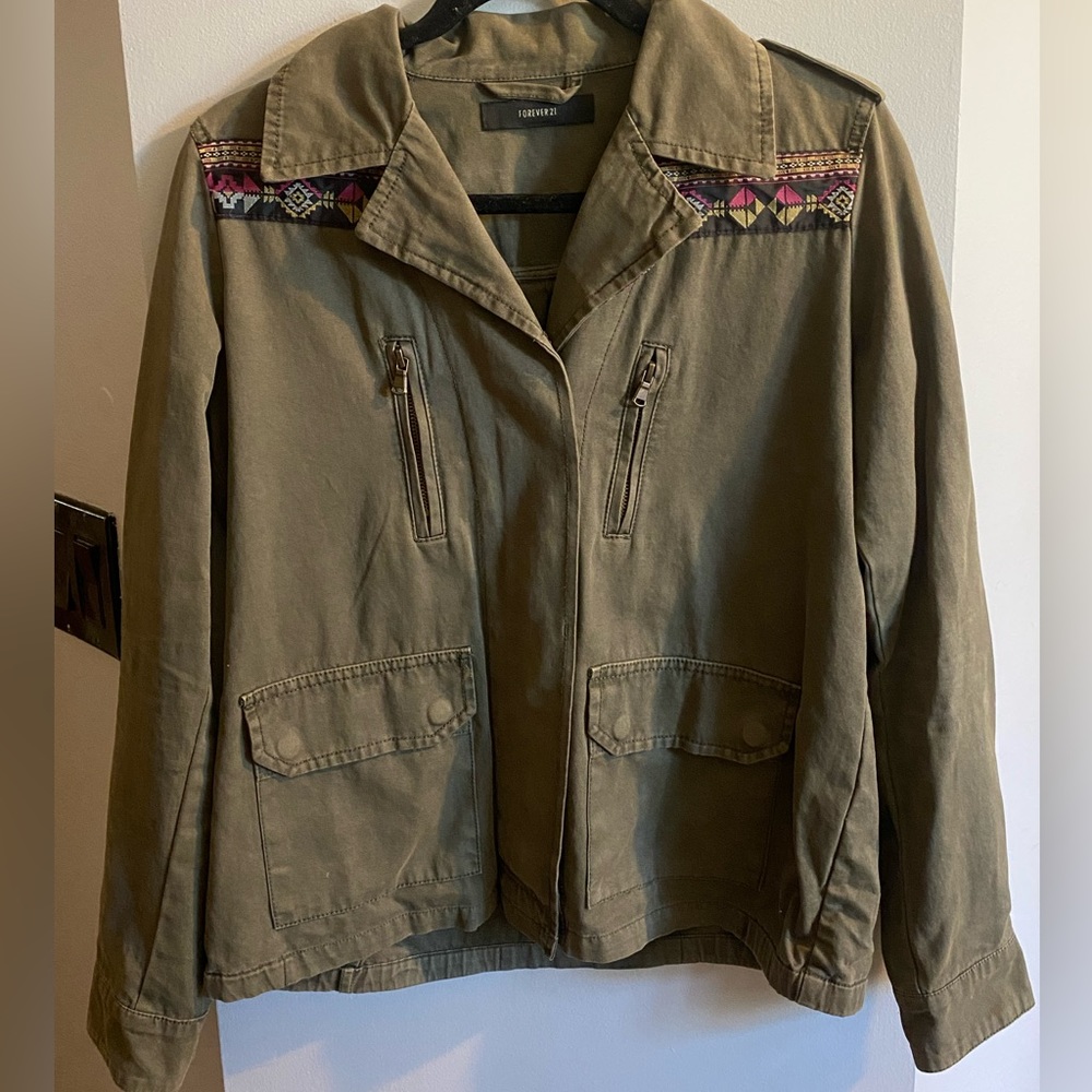 Army green utility jack w/ embroidered detail along shoulder & collar bone area.